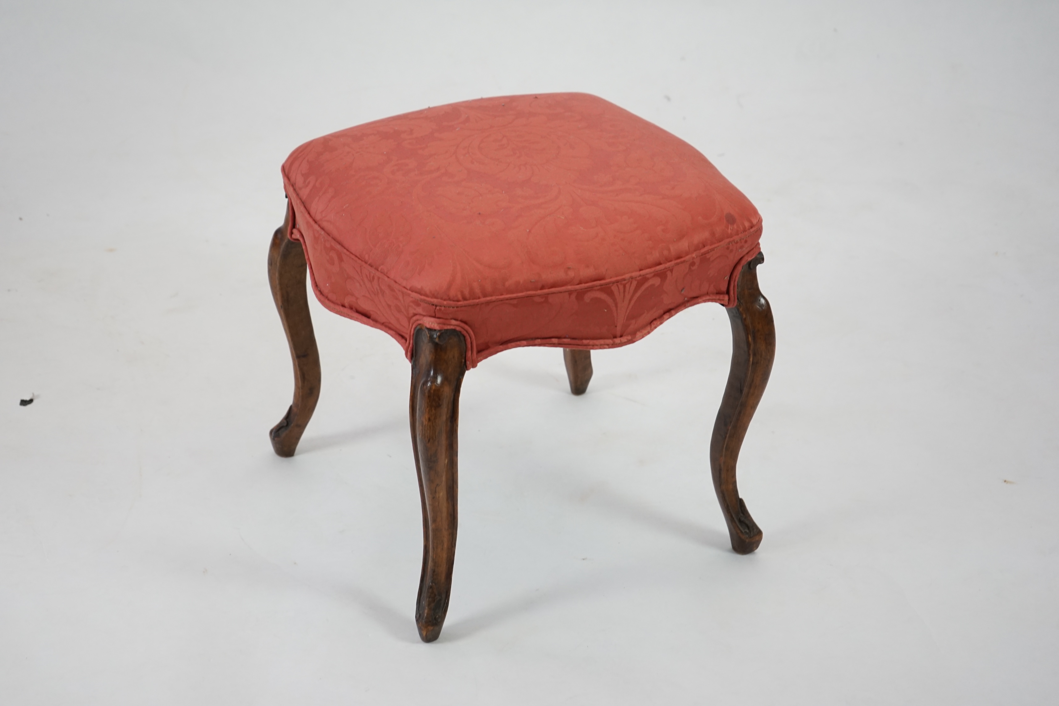 A Victorian mahogany dressing stool